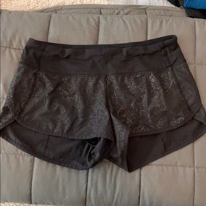 Black patterned lululemon shorts